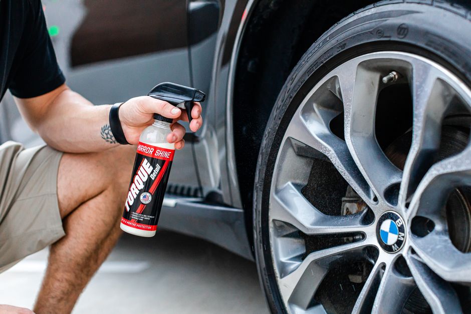 Polishing a car wheel for auto wash membership clients
